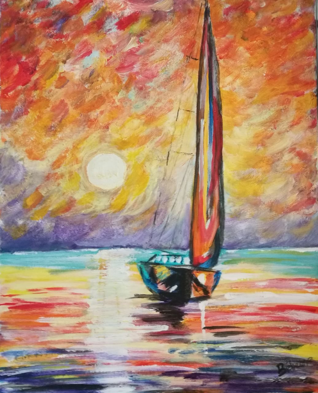 Bateau dans le coucher de soleil