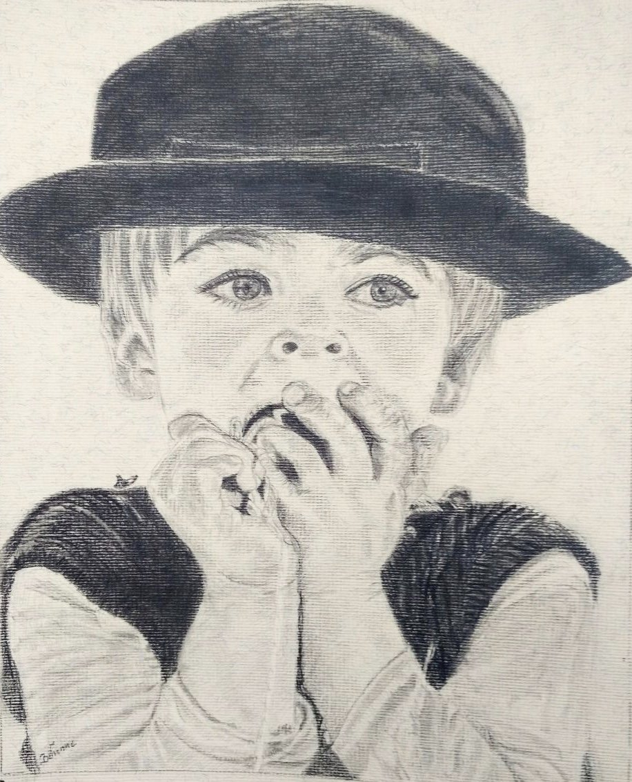 Petit gars au chapeau